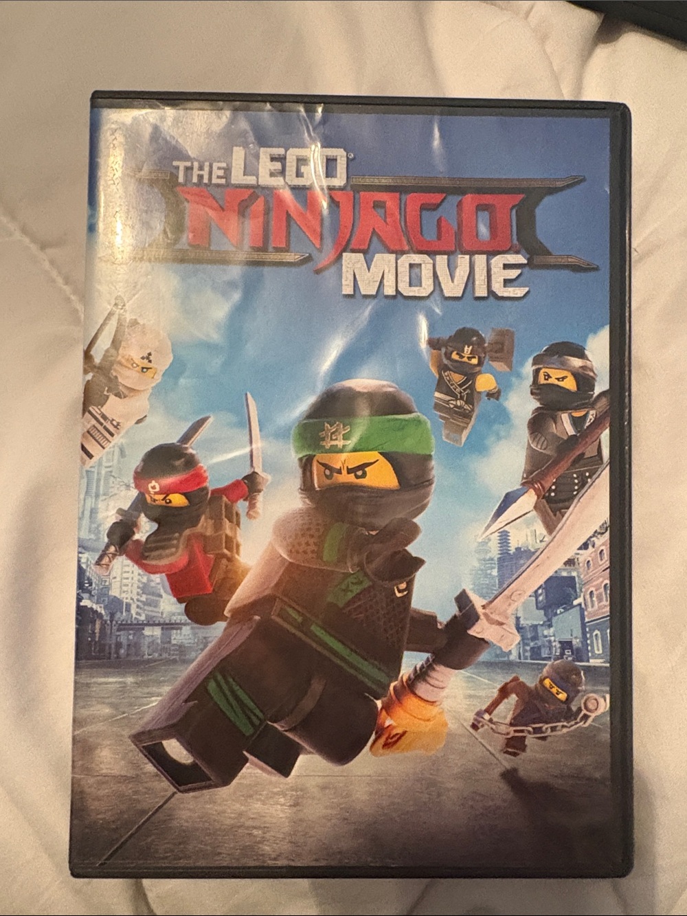 Lego Ninjago Movie Cover — Green, Black, Red, Blue